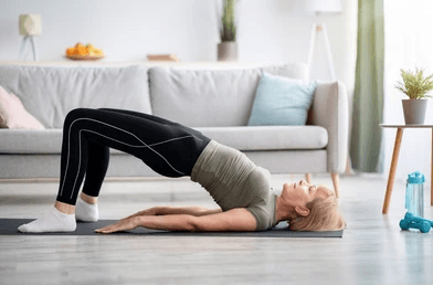 A girl with Bridge Pose - Shutterstock