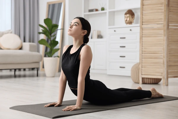 Cobra Pose - girl-practicing-cobra-asana-shutterstock