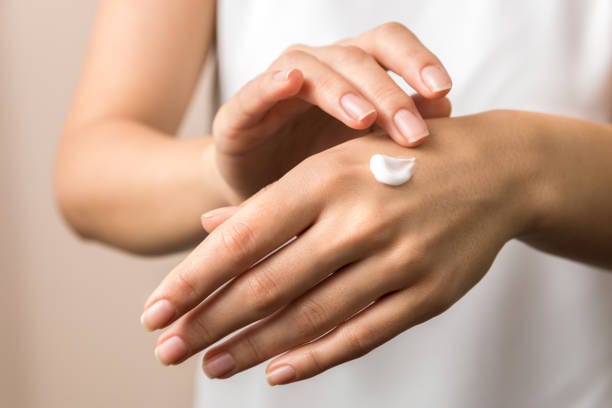skincare. close up view of woman hand moisturising them with cream. skincare., skincare. close up view of woman hand moisturising them with cream. skincare.