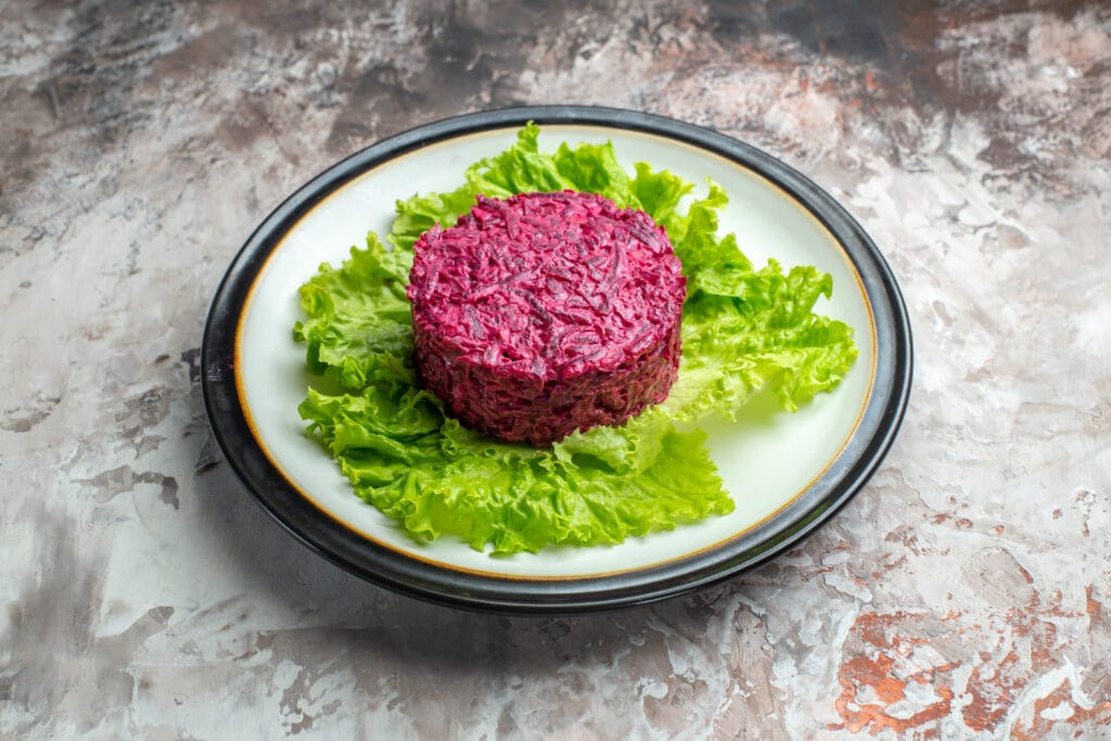 front-view-delicious-beet-salad-round-shaped-green-salad-light-background, Iron – For Energy and Oxygen Flow